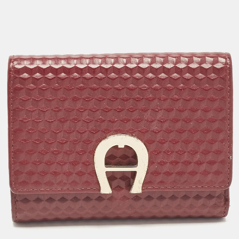 Women's money clip for travel - easy to carry​Aigner Burgundy Embossed Leather Genoveva Trifold Compact Wallet