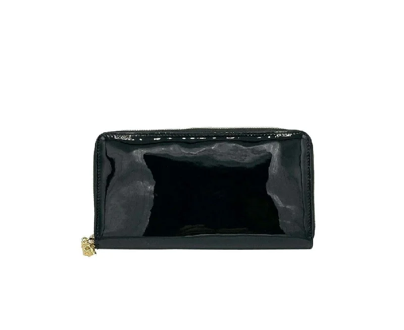 Women's money clip in a metallic sheen finish​Alexander McQueen Women's  Patent Leather Skull Zip Around Wallet