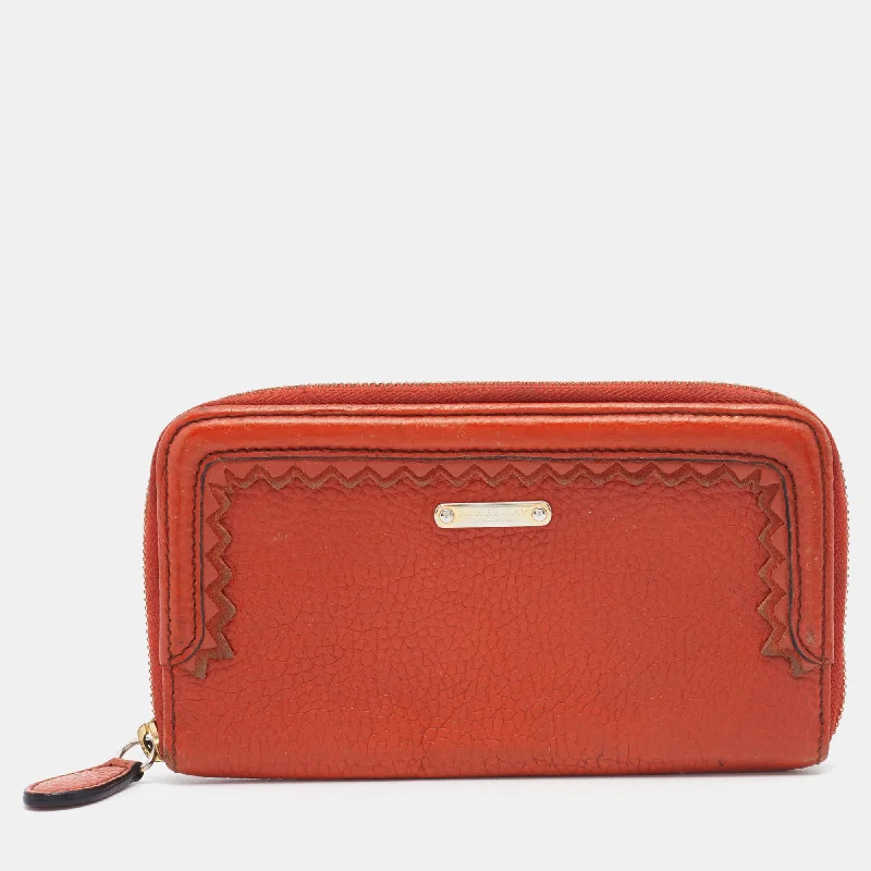 Women's money clip with a mirror on the back​Burberry Prorsum Orange Leather Zip Around Wallet