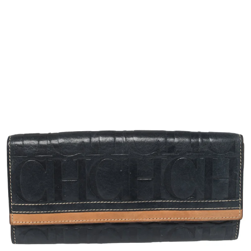 Women's money clip in a metallic sheen finish​Carolina Herrera Blue/tan Embossed Leather Flap Wallet