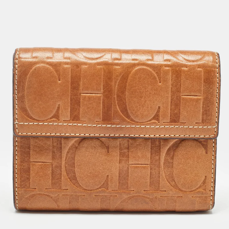 Women's leather money clip with embossed design​Carolina Herrera Brown Monogram Embossed Leather Trifold Wallet
