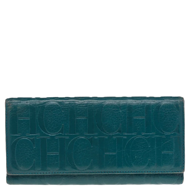 Women's money clip with a braided leather strapCarolina Herrera Green Monogram Embossed Leather Flap Continental Wallet.. Women's money clip with a braided leather strapCarolina Herrera Green Monogram Embossed Leather Flap Continental Wallet..