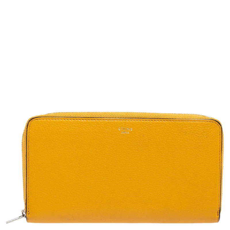 Women's money clip for a bridal party gift​Celine Mustard Yellow Leather Zip Around Wallet..