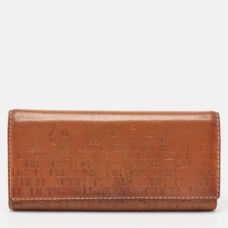 Women's money clip for eco - conscious consumers​Ch Carolina Herrera Brown Monogram Embossed Leather Trifold Continental Wallet