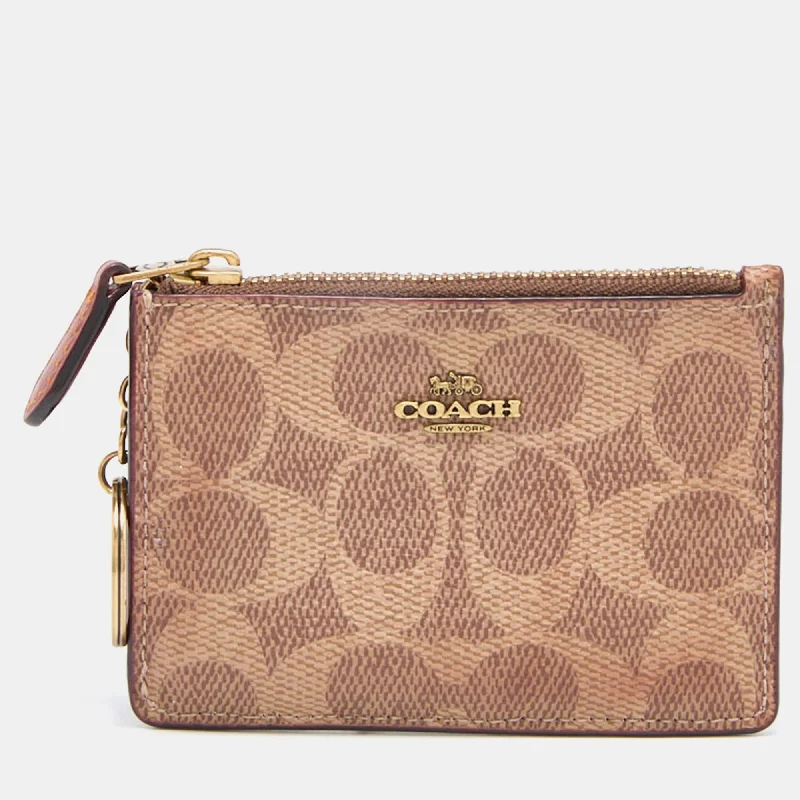 Women's money clip with a quilted texture​Coach Beige/brown Signature Coated Canvas And Leather Zip Skinny Id Case