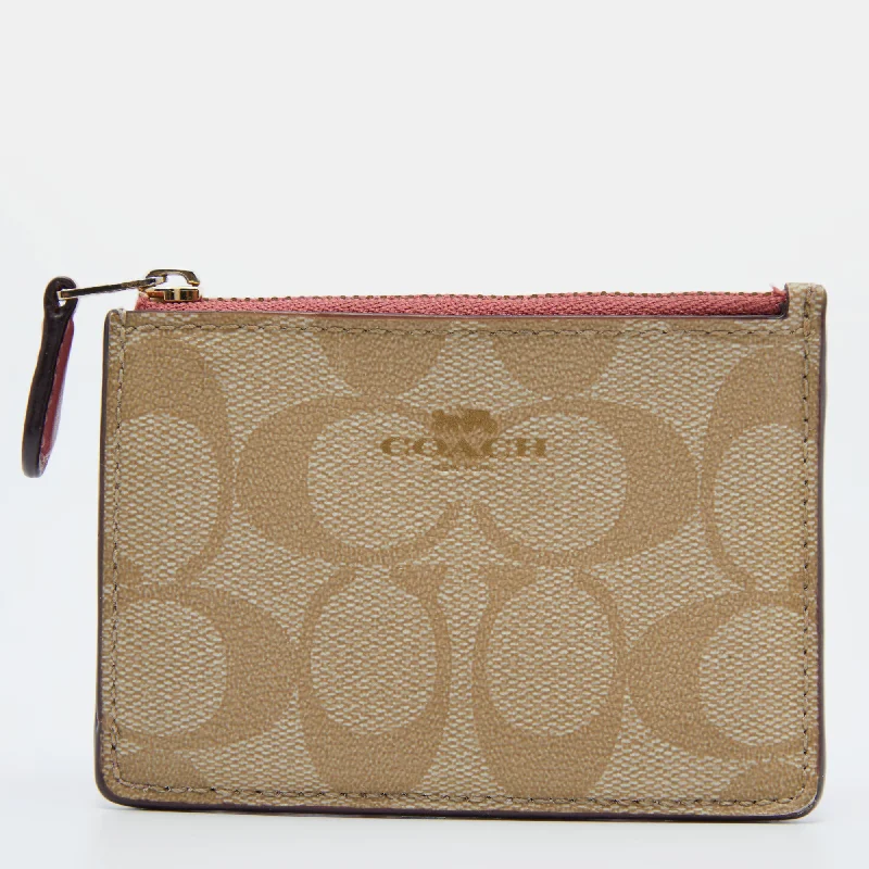 Women's money clip for left - handed users​Coach Beige/pink Signature Coated Canvas And Leather Zip Card Holder