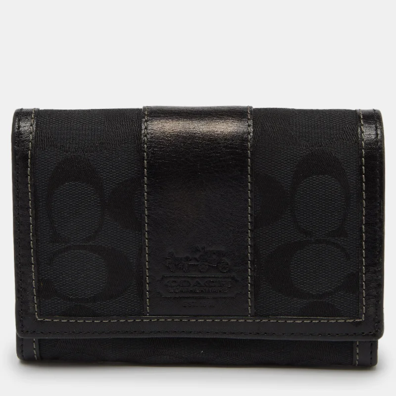 Compact women's money clip for small purses​Coach Black Signature Canvas And Leather Continental Wallet