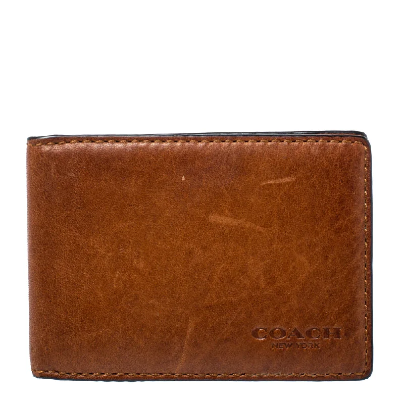 Women's money clip for the modern bohemian style​Coach Brown Leather Bifold Card Holder