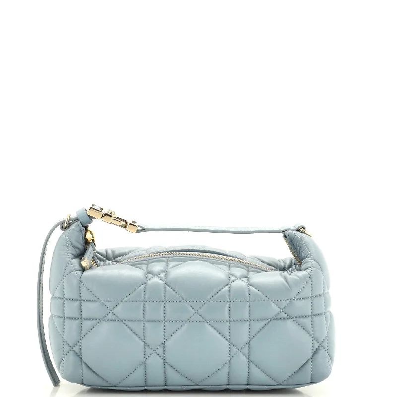Women's money clip with a faux fur trim​DiorTravel Nomad Pouch Macrocannage Quilt Calfskin Medium