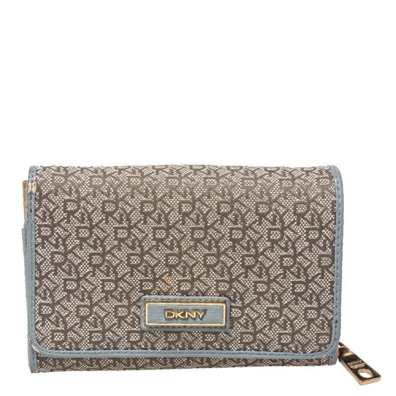Women's money clip with a braided leather strap​Dkny Grey Monogram Canvas And Leather Flap Wallet