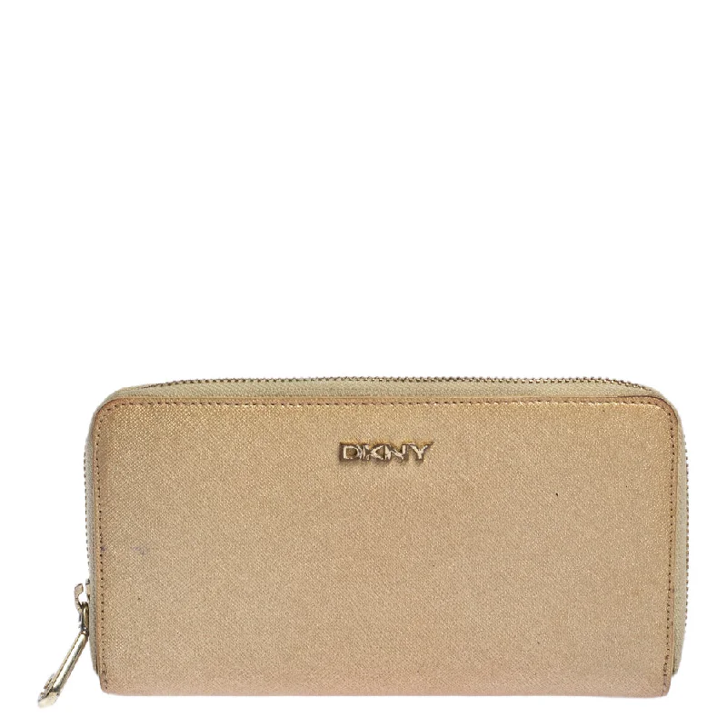 Women's money clip with a faux fur trim​Dkny Metallic Beige Leather Zip Around Wallet