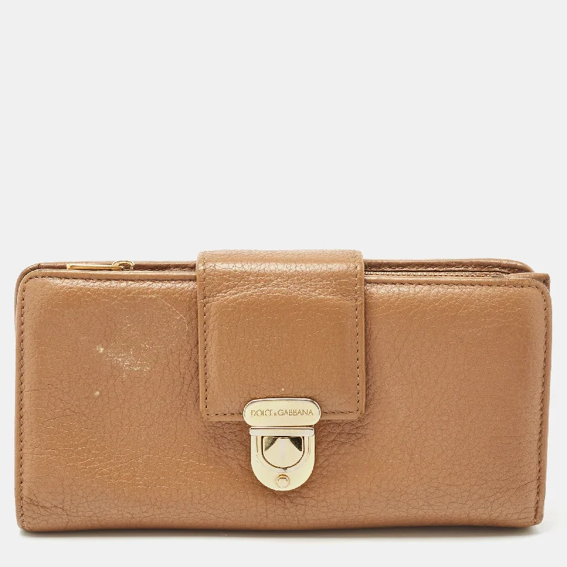 Women's money clip with a braided leather strap​Dolce & Gabbana Beige Leather Padlock Wallet