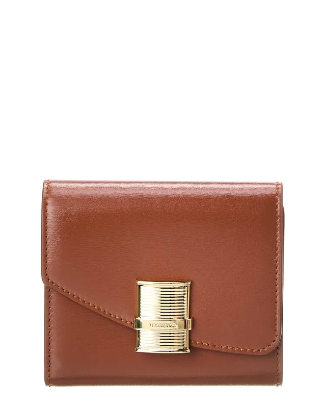 Women's money clip with a mirror on the back​Ferragamo Fiamma Leather Compact Wallet