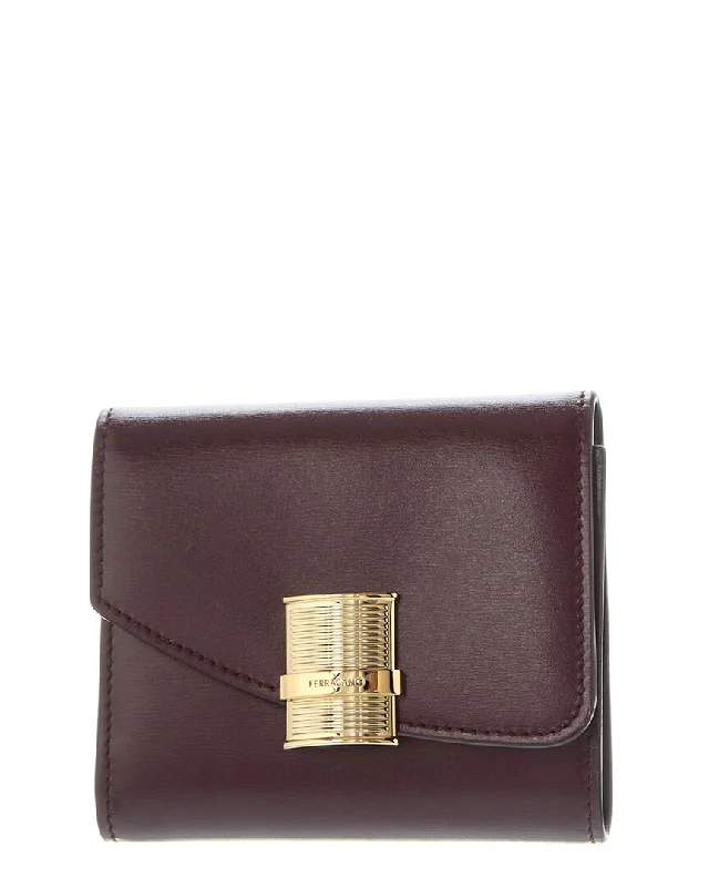 Women's money clip for the modern bohemian style​Ferragamo Fiamma Leather Compact Wallet