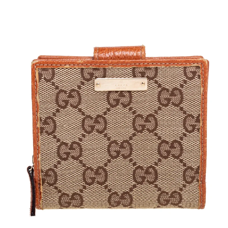 Women's money clip in a metallic sheen finish​Gucci Beige Gg Canvas Zip Around French Compact Wallet..