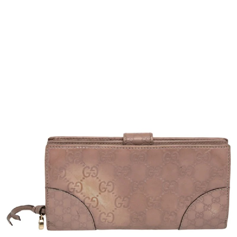 Women's money clip in a trendy geometric shape​Gucci Beige Guccissima Leather Bree Bifold Wallet