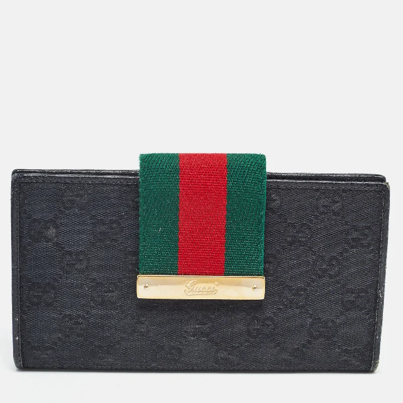 Designer women's money clip for luxury lovers​Gucci Black Gg Canvas And Leather Web Flap Wallet