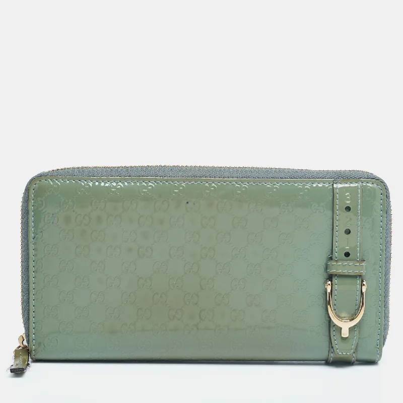Women's money clip with a magnetic closureGucci Green Microguccissima Patent Leather Zip Around Wallet.. Women's money clip with a magnetic closureGucci Green Microguccissima Patent Leather Zip Around Wallet..