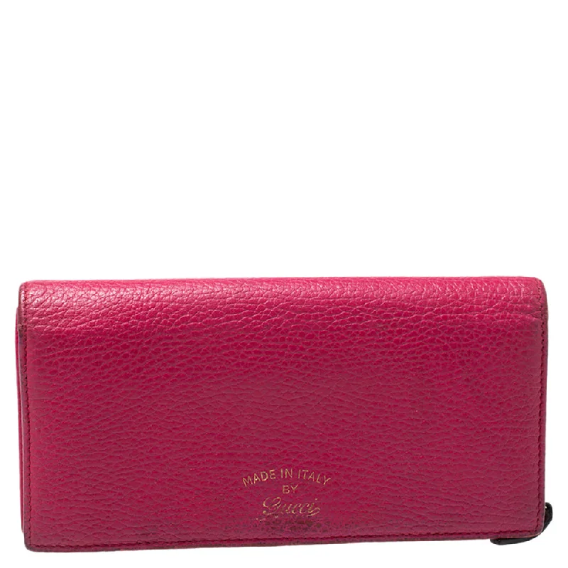 Women's money clip with a transparent acrylic design​Gucci Magenta Leather Swing Continental Wallet..