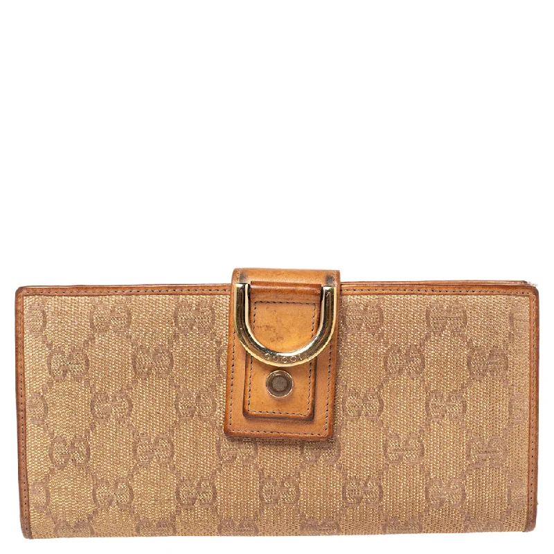 Women's money clip with a double - sided design​Gucci Metallic Beige Gg Canvas And Leather D Ring Continental Wallet..