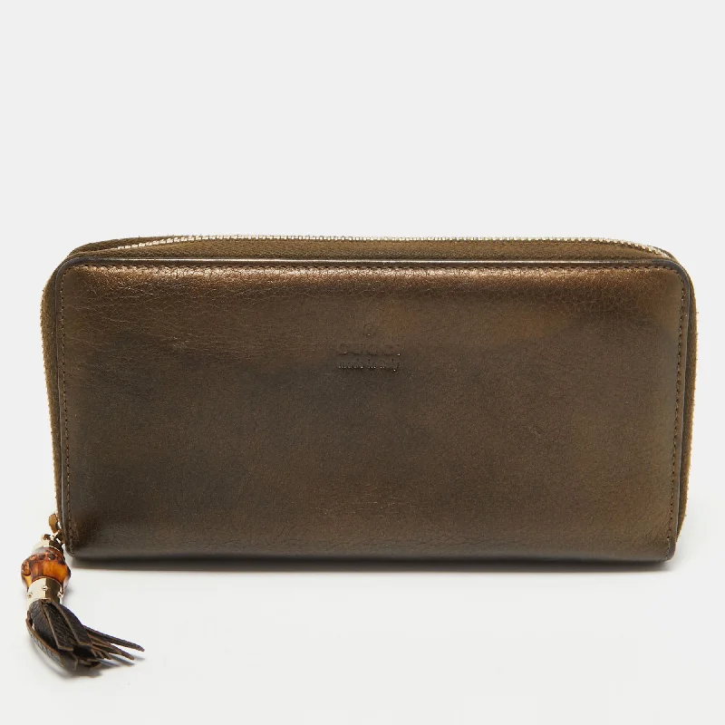 Women's money clip for a bridal party gift​Gucci Metallic Leather Bamboo Tassel Zip Around Wallet
