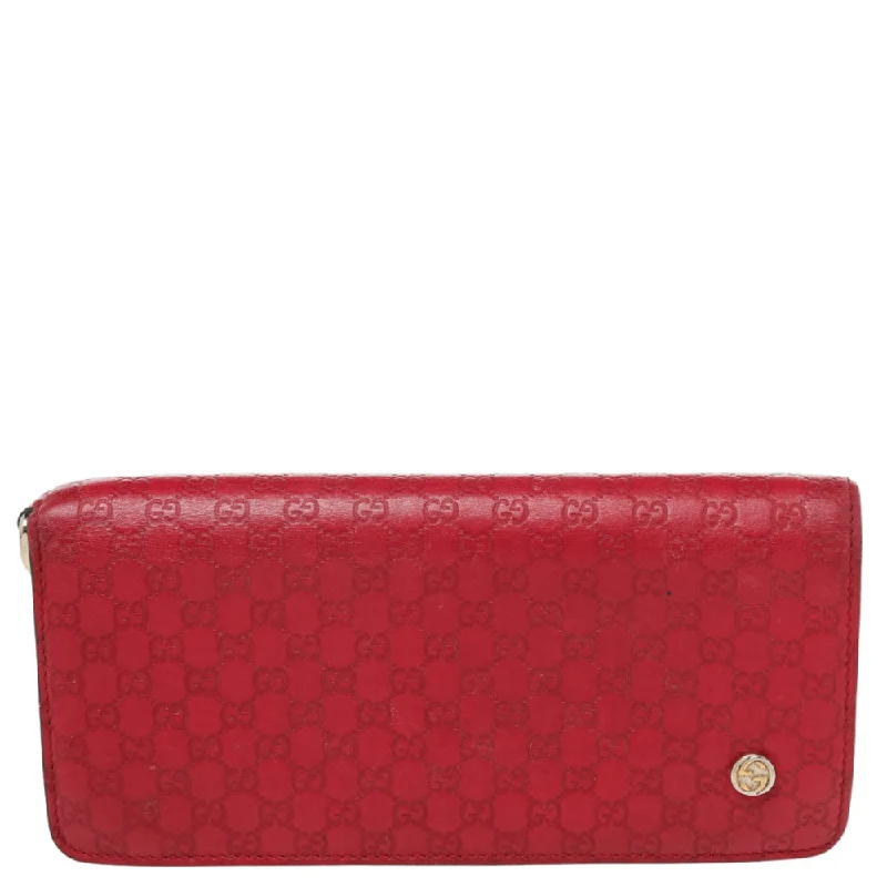Women's money clip with a heart - shaped cutout​Gucci Red Microguccissima Leather Bifold Wallet..