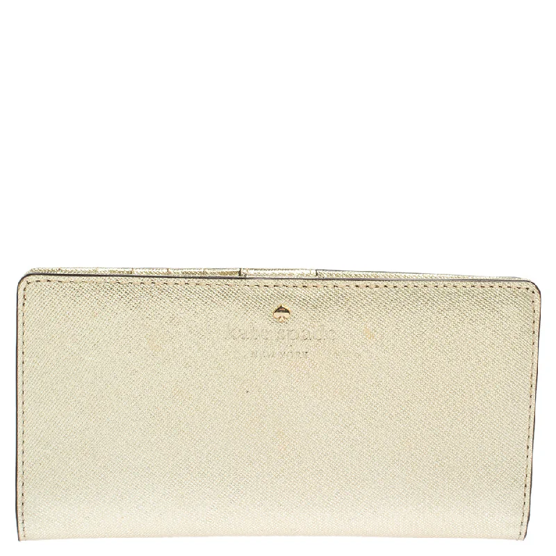 Stylish women's money clip for business meetingsKate Spade Metallic Gold Leather Long Flap Wallet.. Stylish women's money clip for business meetingsKate Spade Metallic Gold Leather Long Flap Wallet..