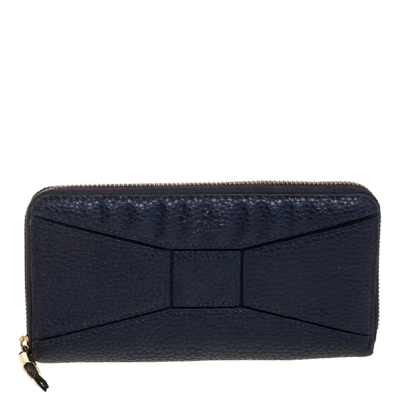 Women's money clip with a swarovski crystal accent​Kate Spade Navy Blue Leather Zip Around Wallet