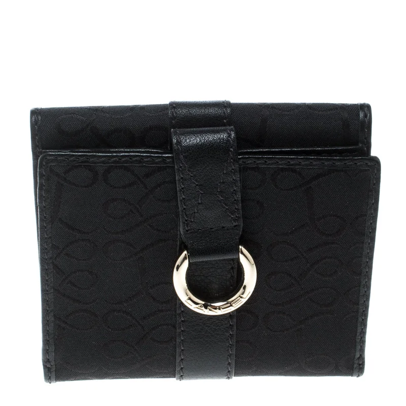 Women's money clip with a braided leather strap​Lancel Black Canvas French Wallet..