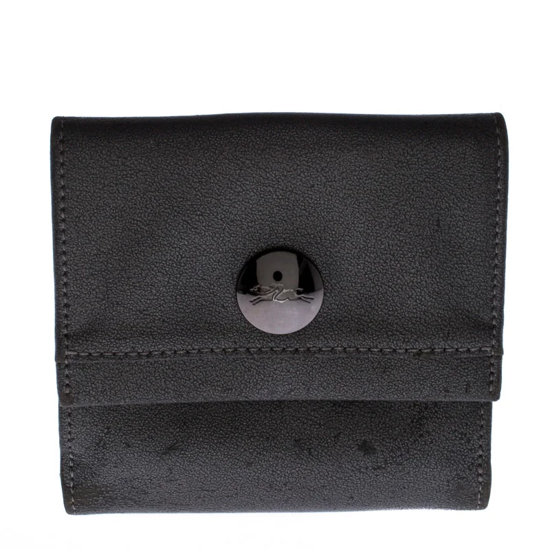 Women's money clip for a back - to - school accessory​Longchamp Metallic Grey Leather Flap Button Compact Wallet..