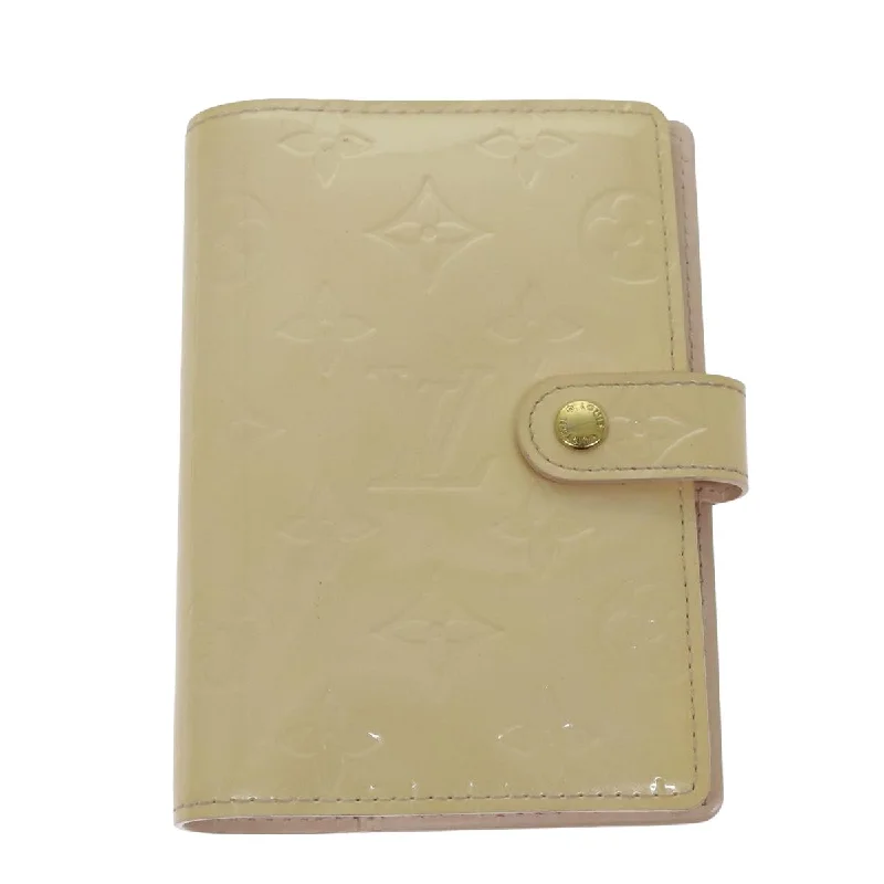Women's money clip with a faux fur trim​Louis Vuitton Agenda Pm  Patent Leather Wallet  (Pre-Owned)