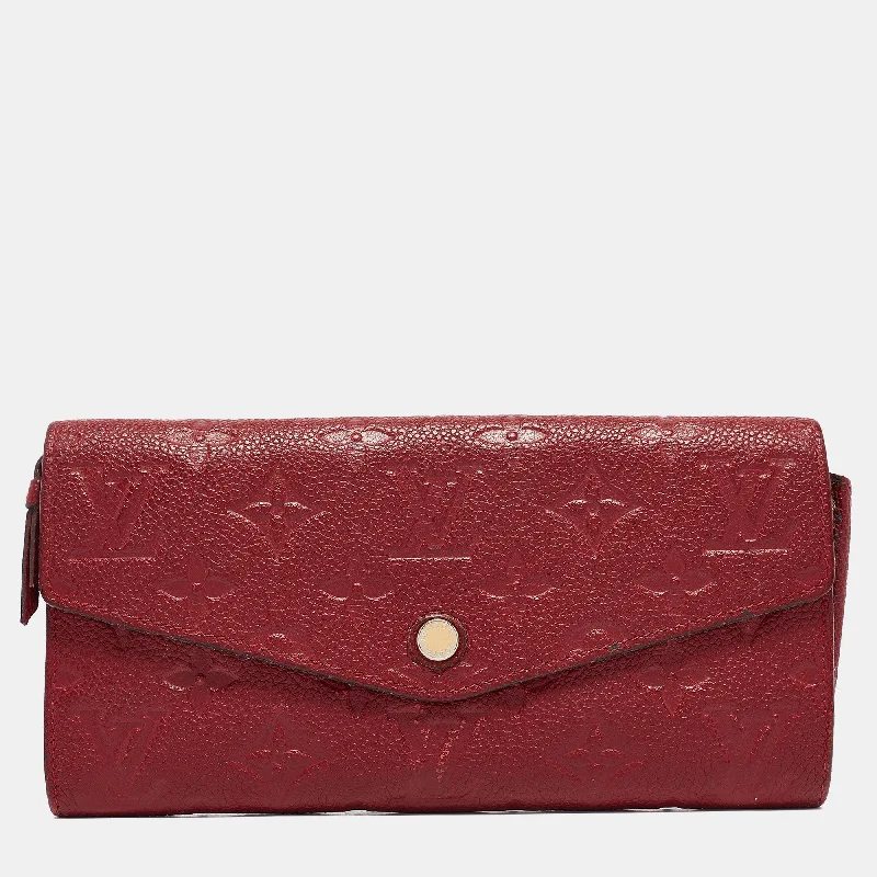 Women's money clip with a scalloped edge​Louis Vuitton Aurore Monogram Empreinte Leather Sarah Wallet