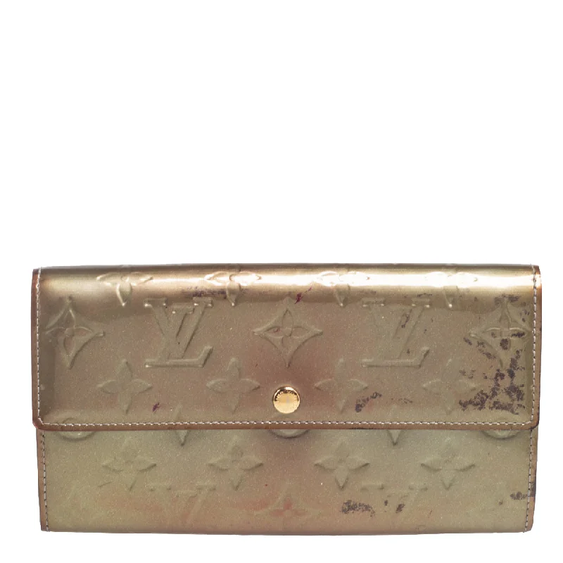 Women's money clip in a metallic sheen finish​Louis Vuitton Gris Art Deco Monogram Vernis Sarah Wallet..