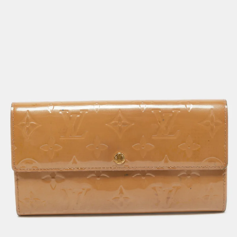Elegant women's money clip for formal occasions​Louis Vuitton Noisette Monogram Vernis Sarah Wallet..