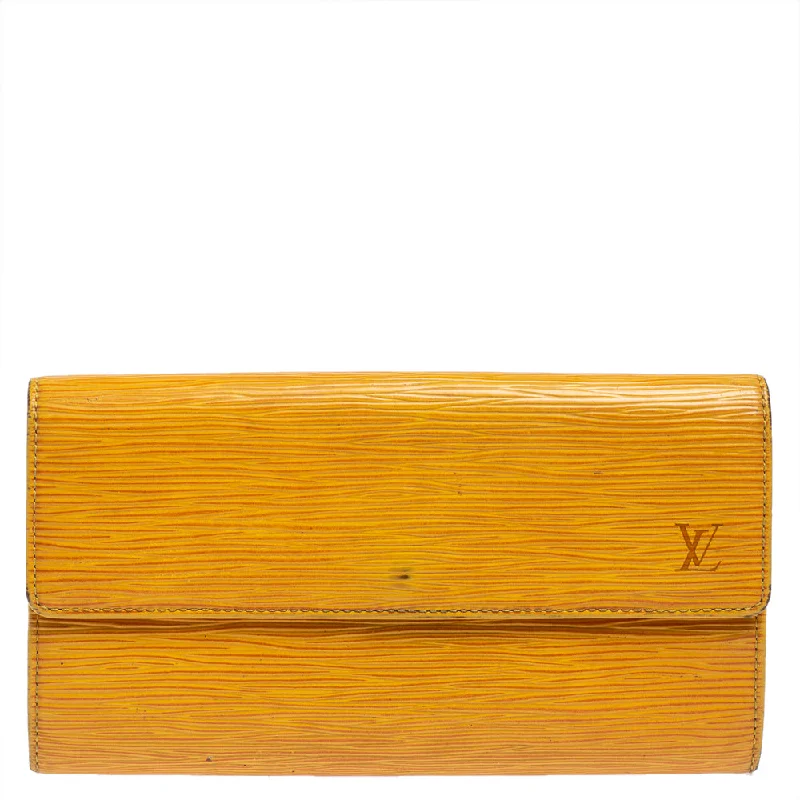 Women's money clip with a leather - wrapped metal core​Louis Vuitton Tassil Yellow Epi Leather Sarah Wallet..