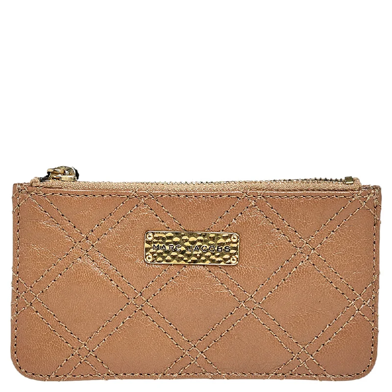 Women's money clip with a mirror on the back​Marc Jacobs Beige Quilted Leather Wallet..