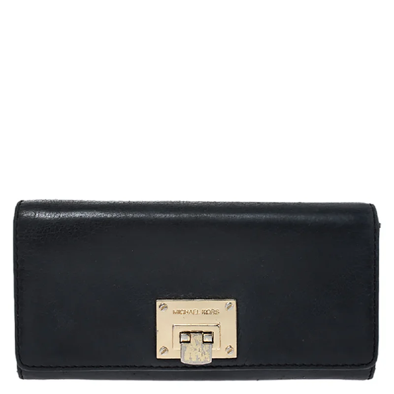 Women's money clip with a fingerprint - resistant finish​Michael Kors Black Leather Flap Continental Wallet..