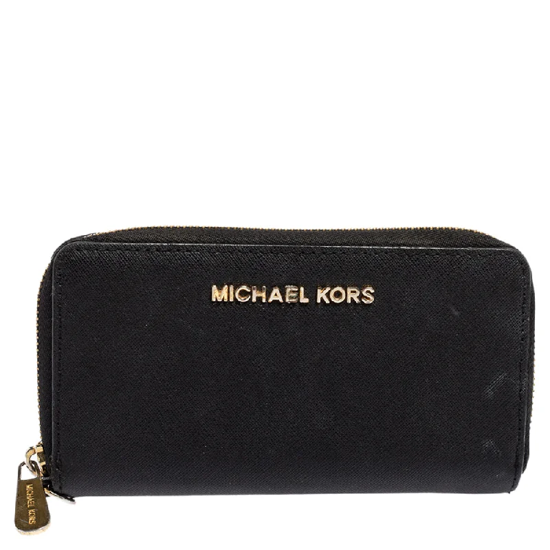 Women's money clip for eco - conscious consumers​Michael Kors Black Leather Jet Set Zip Around Wallet..