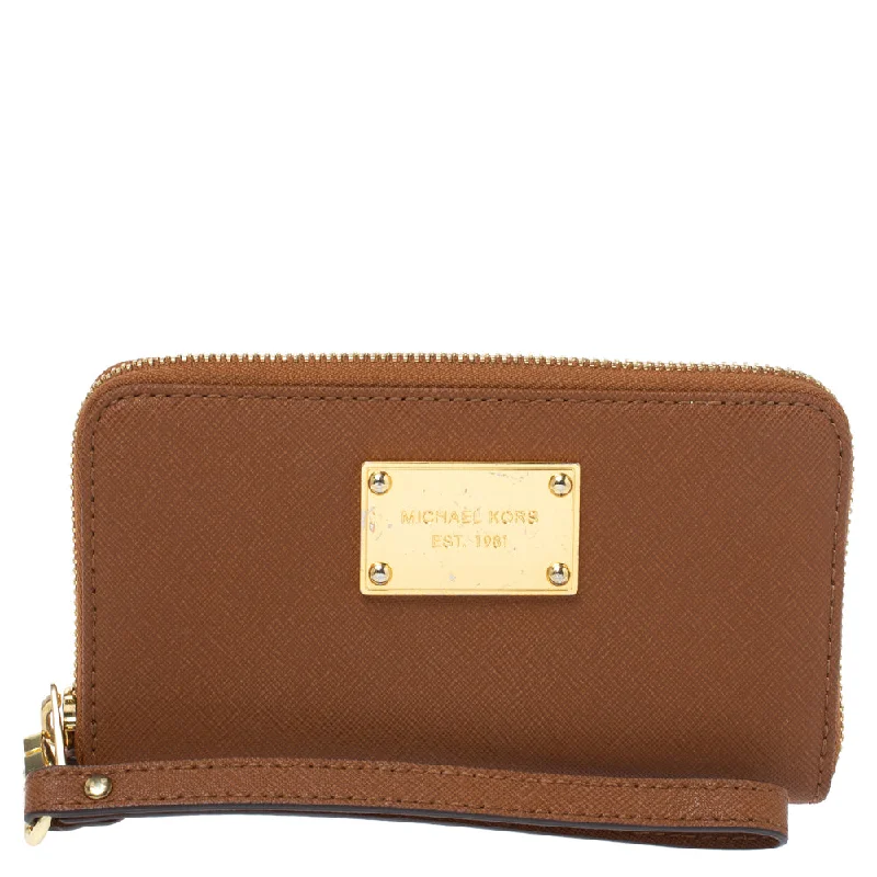 Women's money clip in gold - tone metal​Michael Kors Brown Leather Jet Set Zip Around Wristlet Wallet..