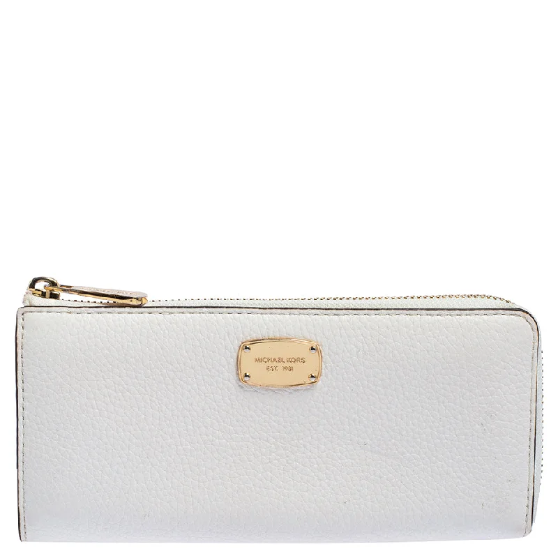 Stylish women's money clip for business meetings​Michael Kors Off White Leather Zip Continental Wallet..