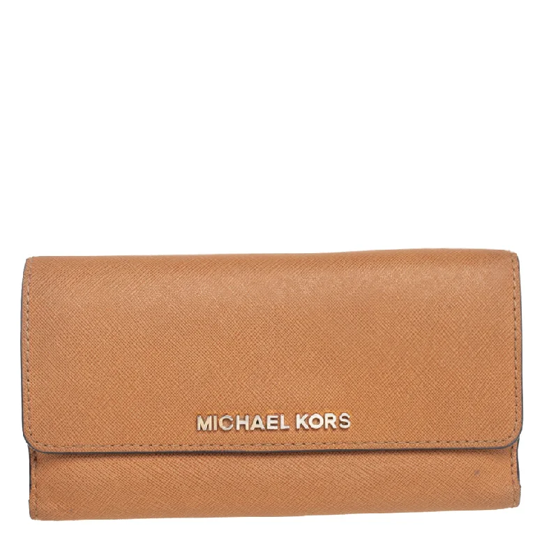 Lightweight women's money clip for everyday use​Michael Kors Tan Leather Continental Wallet..