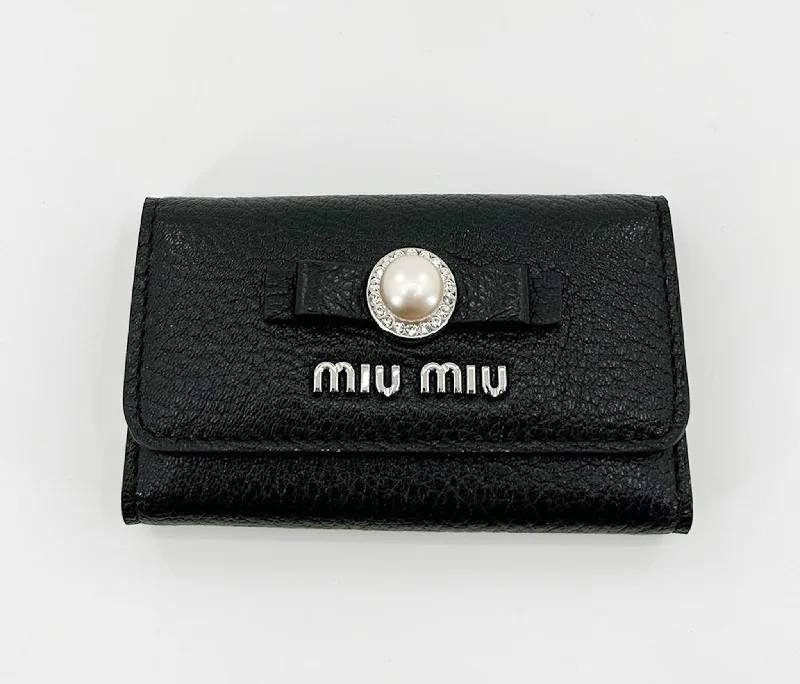 Women's money clip in a pastel color paletteMiu Miu Leather Key Chain Holder - Black Women's money clip in a pastel color paletteMiu Miu Leather Key Chain Holder - Black