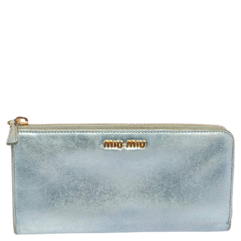Women's money clip with a keychain attachment​Miu Miu Metallic Blue Leather Zip Around Wallet..