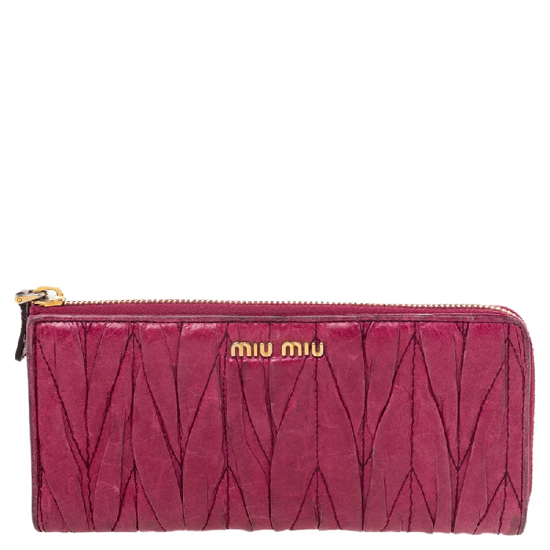 Women's money clip with a built - in card holder​Miu Miu Pink Leather Matelassé Zip Around Wallet..