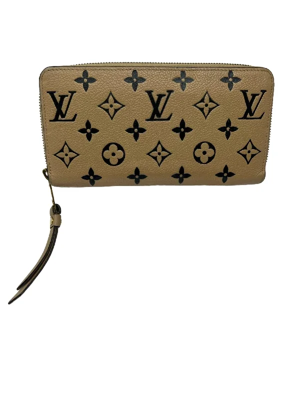 Women's money clip with a personalized monogram​Pre-Loved Empriente Zippy Wallet In Taupe/black