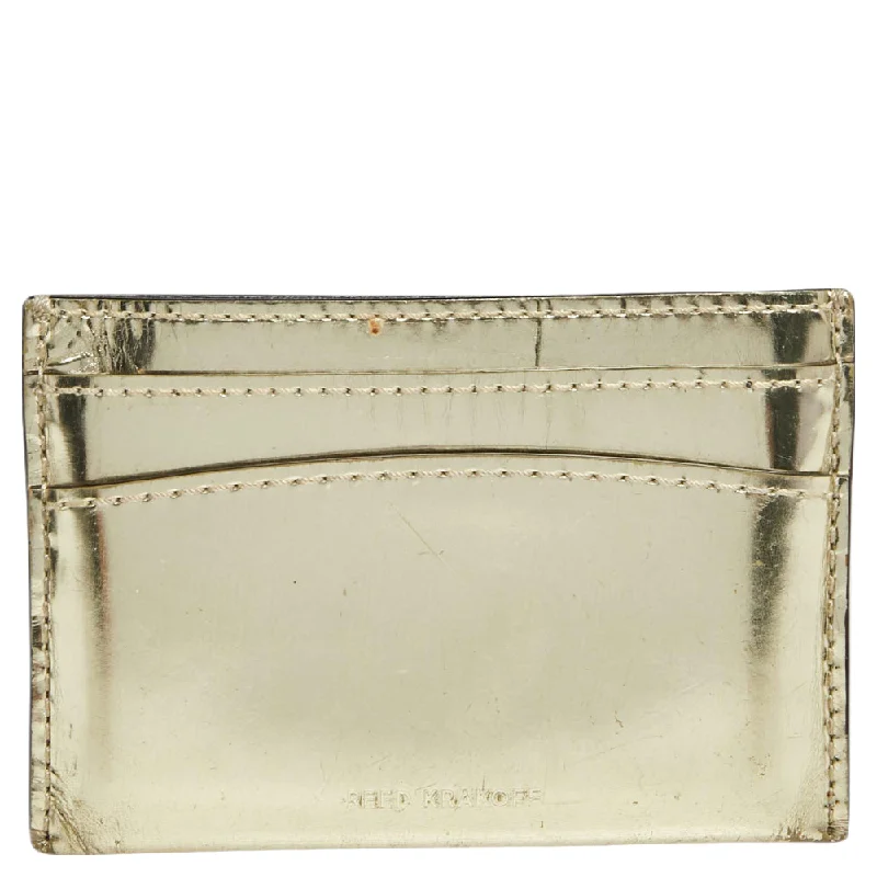 Women's money clip with a quilted texture​Reed Krakoff Metallic Gold Leather Card Holder..