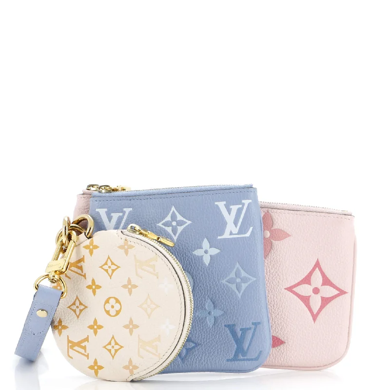 Women's money clip with a scalloped edgeTrio Pouch Set By The Pool Monogram Empreinte Giant Women's money clip with a scalloped edgeTrio Pouch Set By The Pool Monogram Empreinte Giant