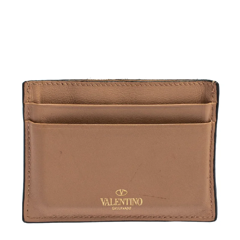 Women's money clip with a leather - wrapped metal core​Valentino Beige Leather Rockstud Card Holder..