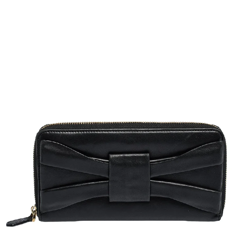 Women's money clip in a pastel color palette​Valentino Black Leather Pleated Bow Continental Wallet
