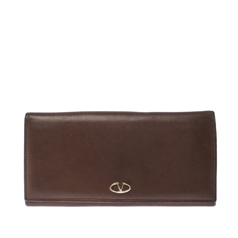 Women's money clip with a zodiac symbol design​Valentino Brown Leather V Ring Flap Continental Wallet